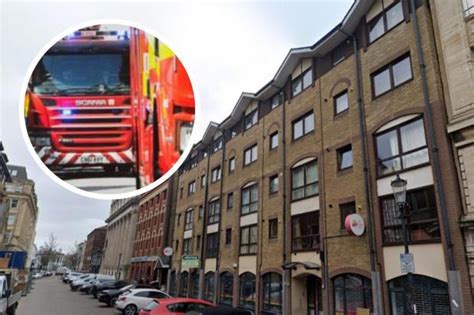 Sixty residents evacuated from flats and some taken to hospital.